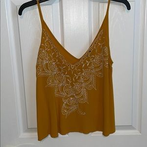 burnt-yellow/orange tank top, loose fitting!